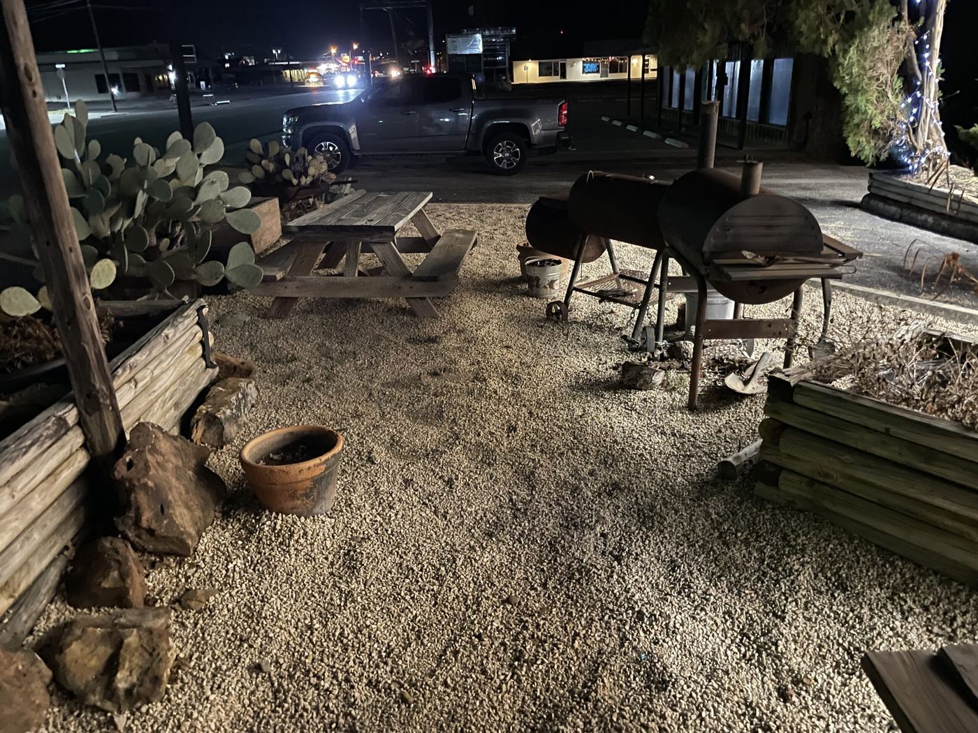 The gravel patio at night